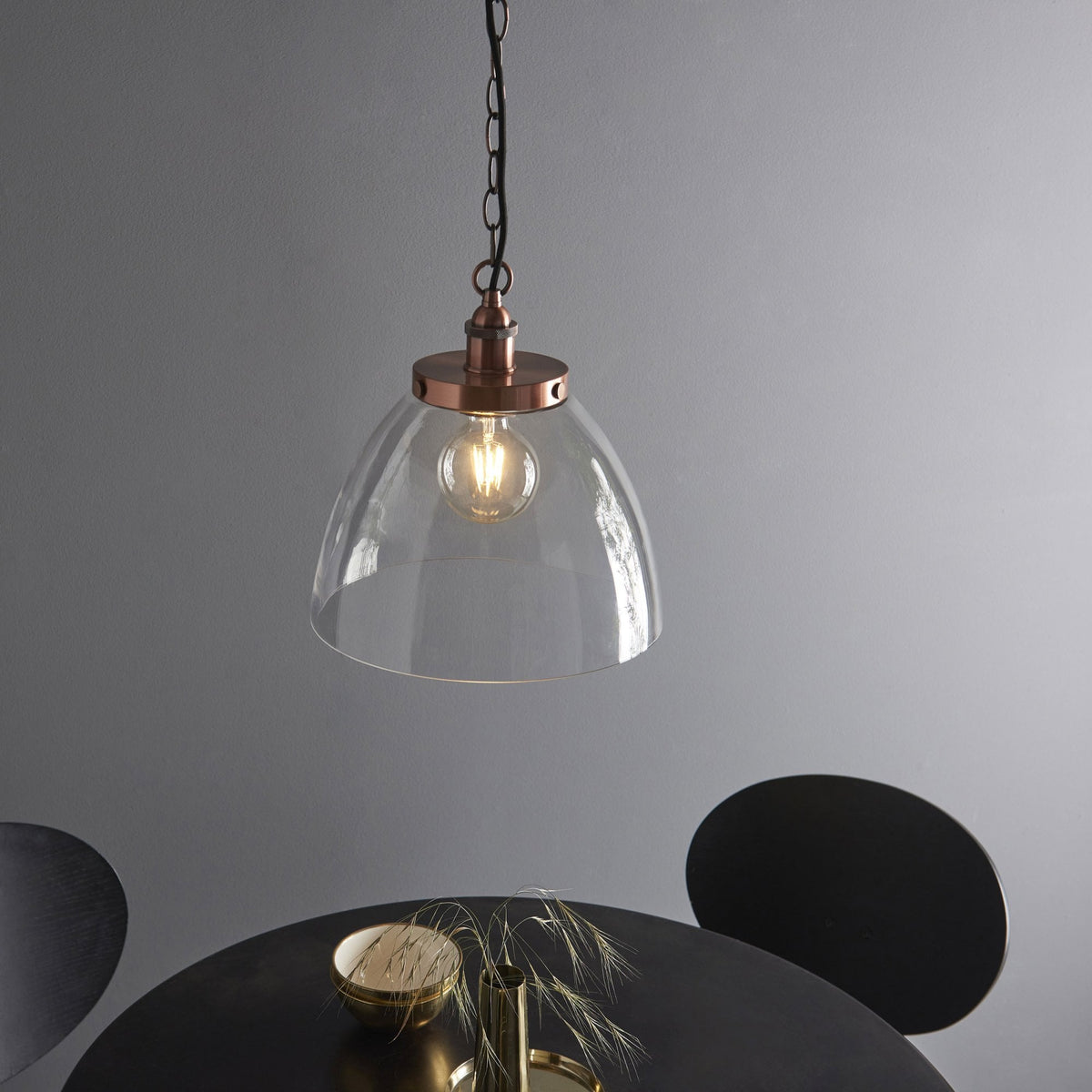 Hansen Grand Single Pendant in Aged Copper with Clear Glass Shade