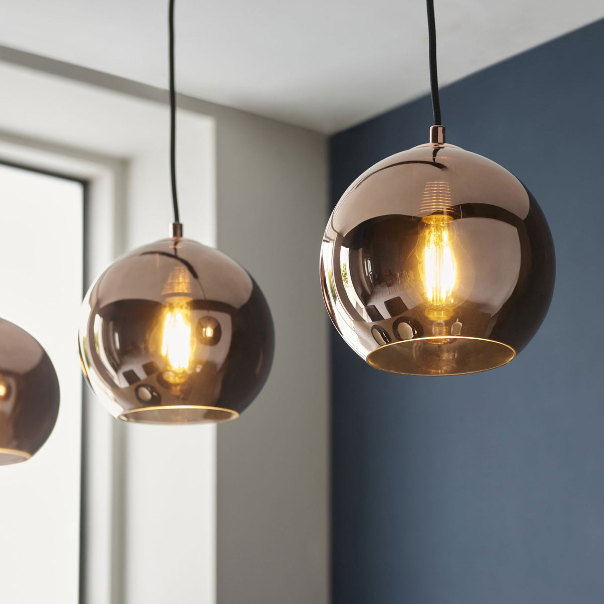 Boli Triple Drop Linear Pendant in Matt Black with Copper Mirrored Glass Shades