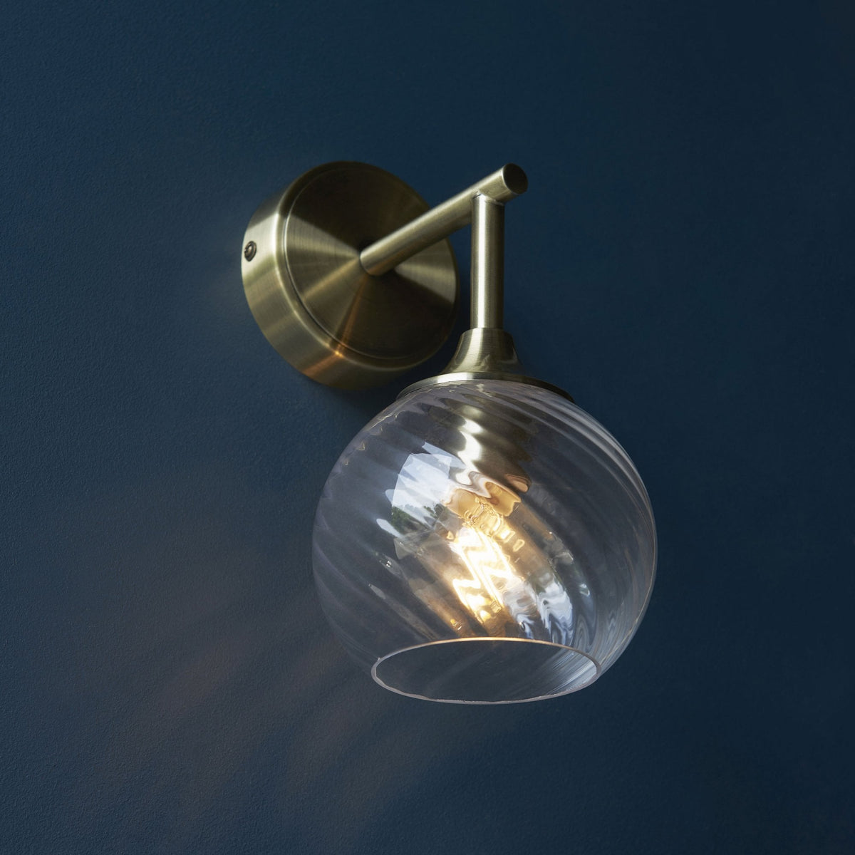 Allegra Wall Light in Antique Brass with Twisted Glass Shade