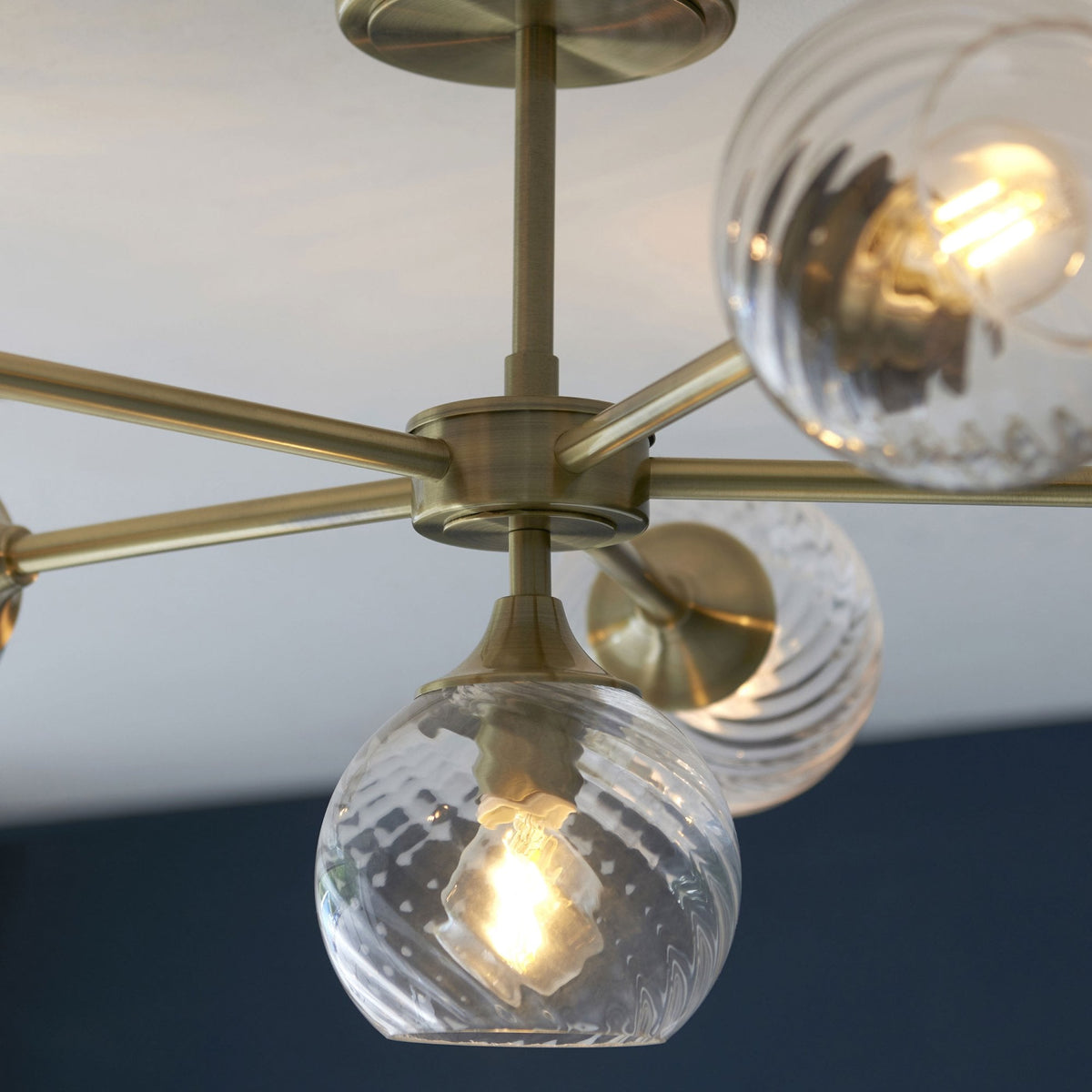 Allegra Six Light Semi Flush in Antique Brass with Twisted Glass Shades