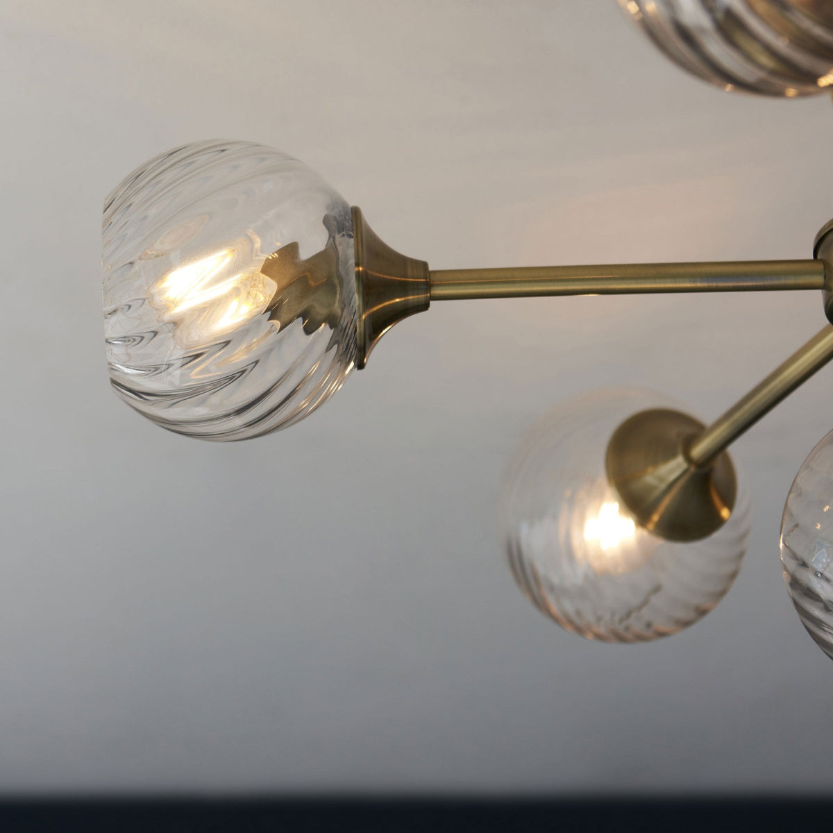 Allegra Six Light Semi Flush in Antique Brass with Twisted Glass Shades