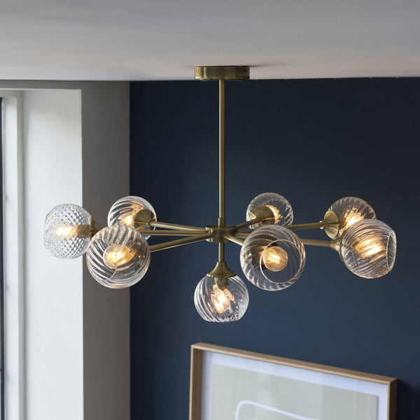 Allegra Eight Light Adjustable Height Semi Flush in Antique Brass with Twisted Glass Shades