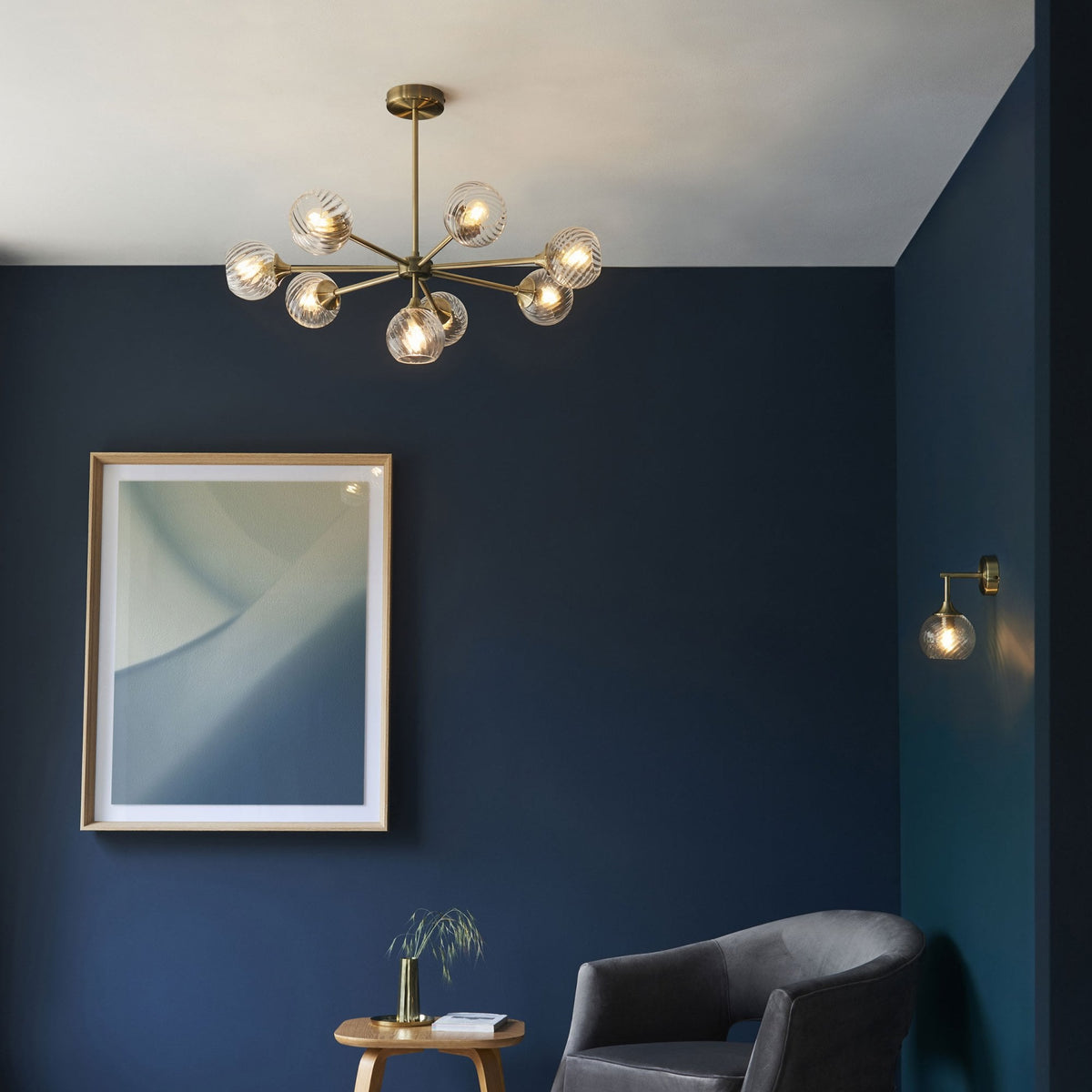 Allegra Eight Light Adjustable Height Semi Flush in Antique Brass with Twisted Glass Shades