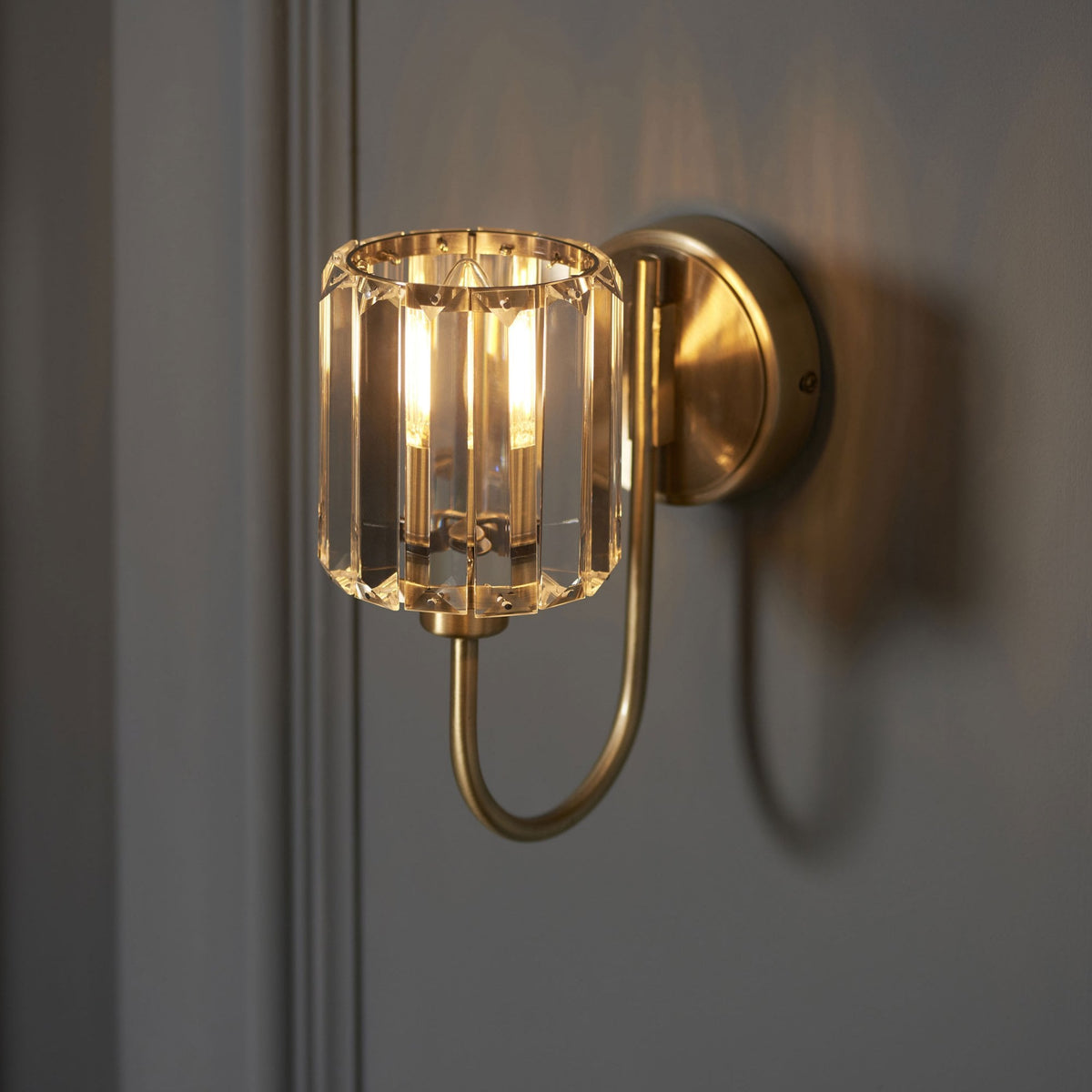 Berenice Wall Light in Antique Brass with Clear Cut Faceted Glass
