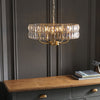 Clifton Five Light Pendant Chandelier in Antique Brass with Clear Cut Faceted Glass