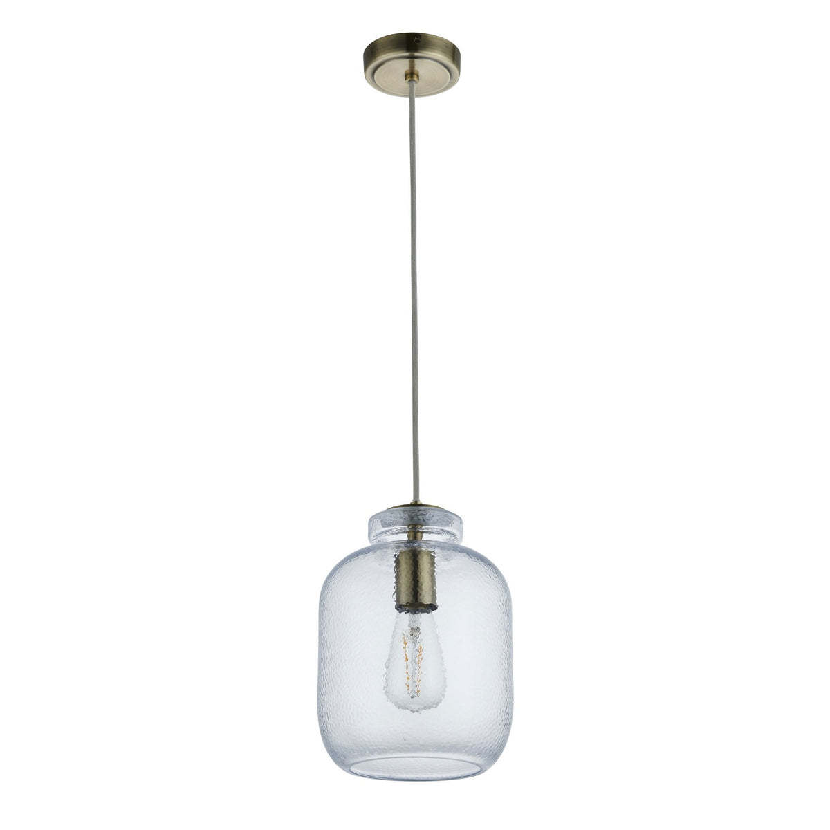 A long shot of the clear, hammered glass pendant light with an antique brass cap.