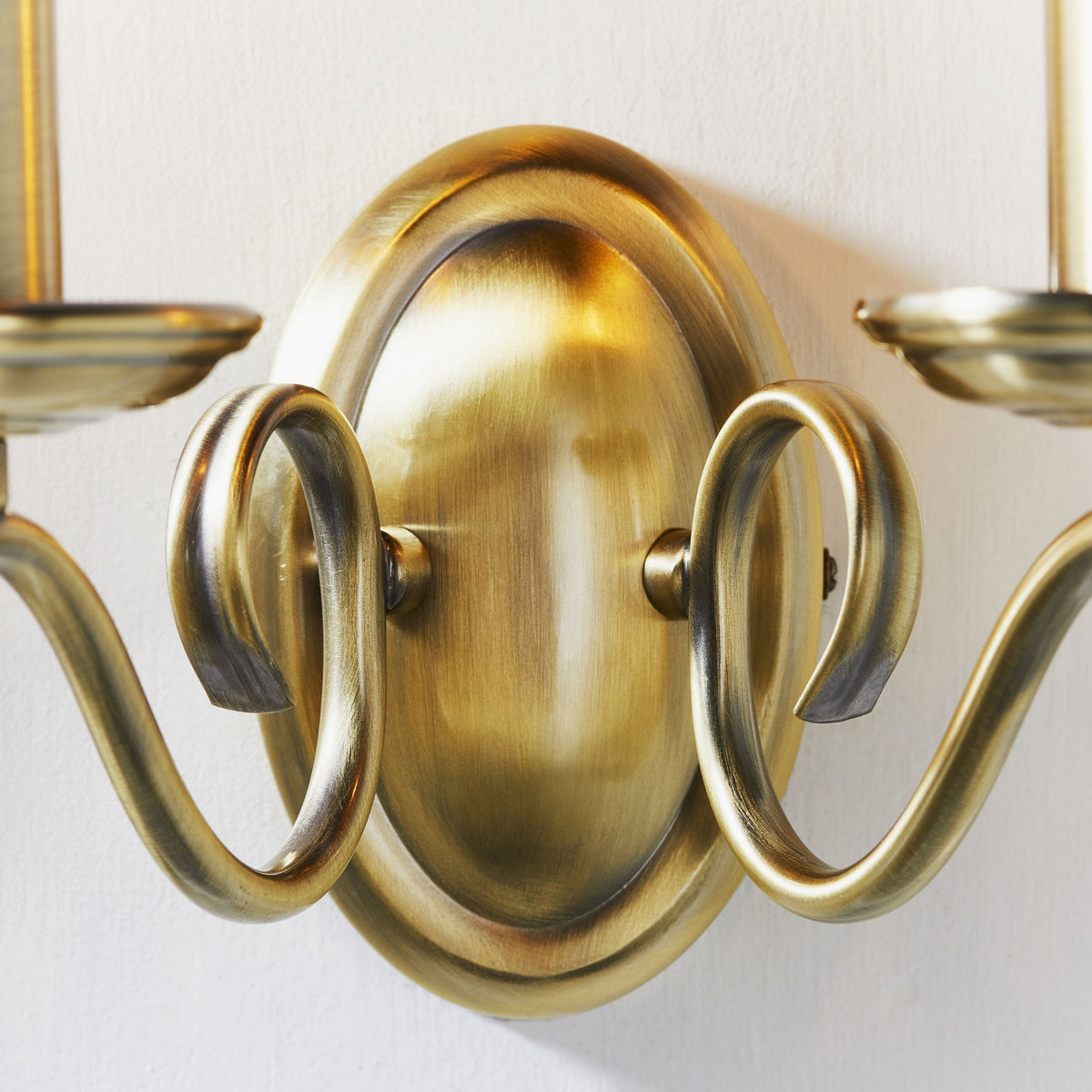 Bernice Two Arm Switched Wall Light in Antique Brass