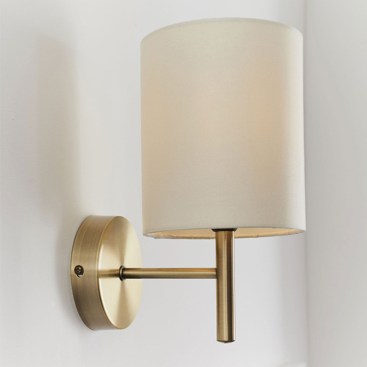 Brio Wall Light in Antique Brass with Cream Shade