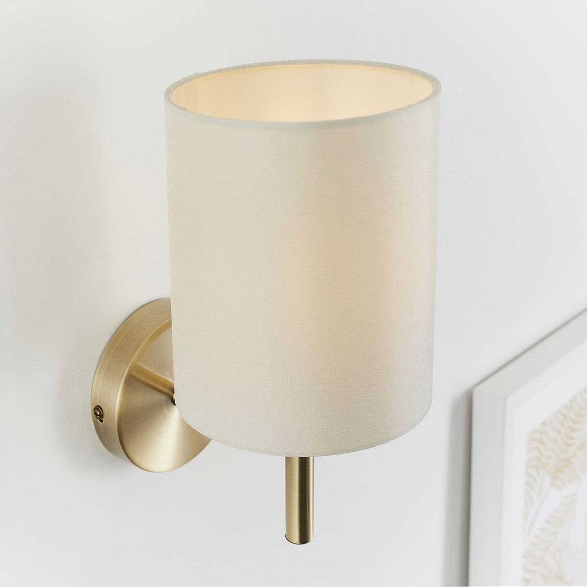 Brio Wall Light in Antique Brass with Cream Shade
