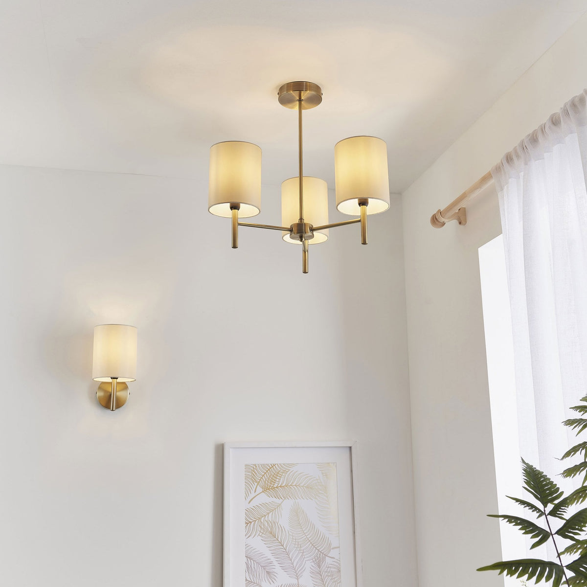 Brio Wall Light in Antique Brass with Cream Shade