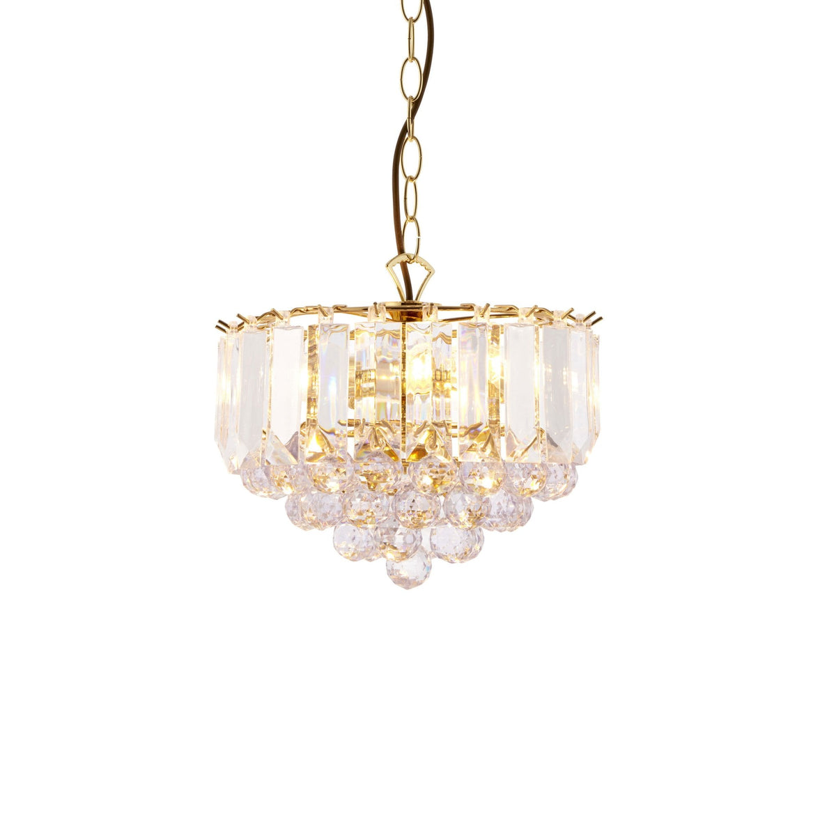 A close-up of the chandelier shows the gold chain and the crystal details.