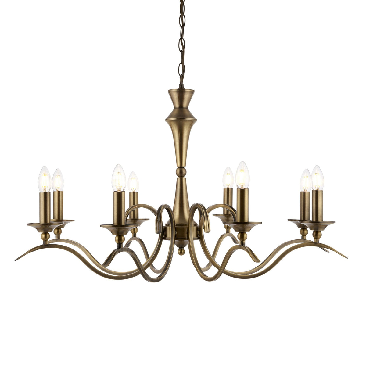 Eight-light antique brass chandelier with curved arms and candle-style bulbs on a white background.