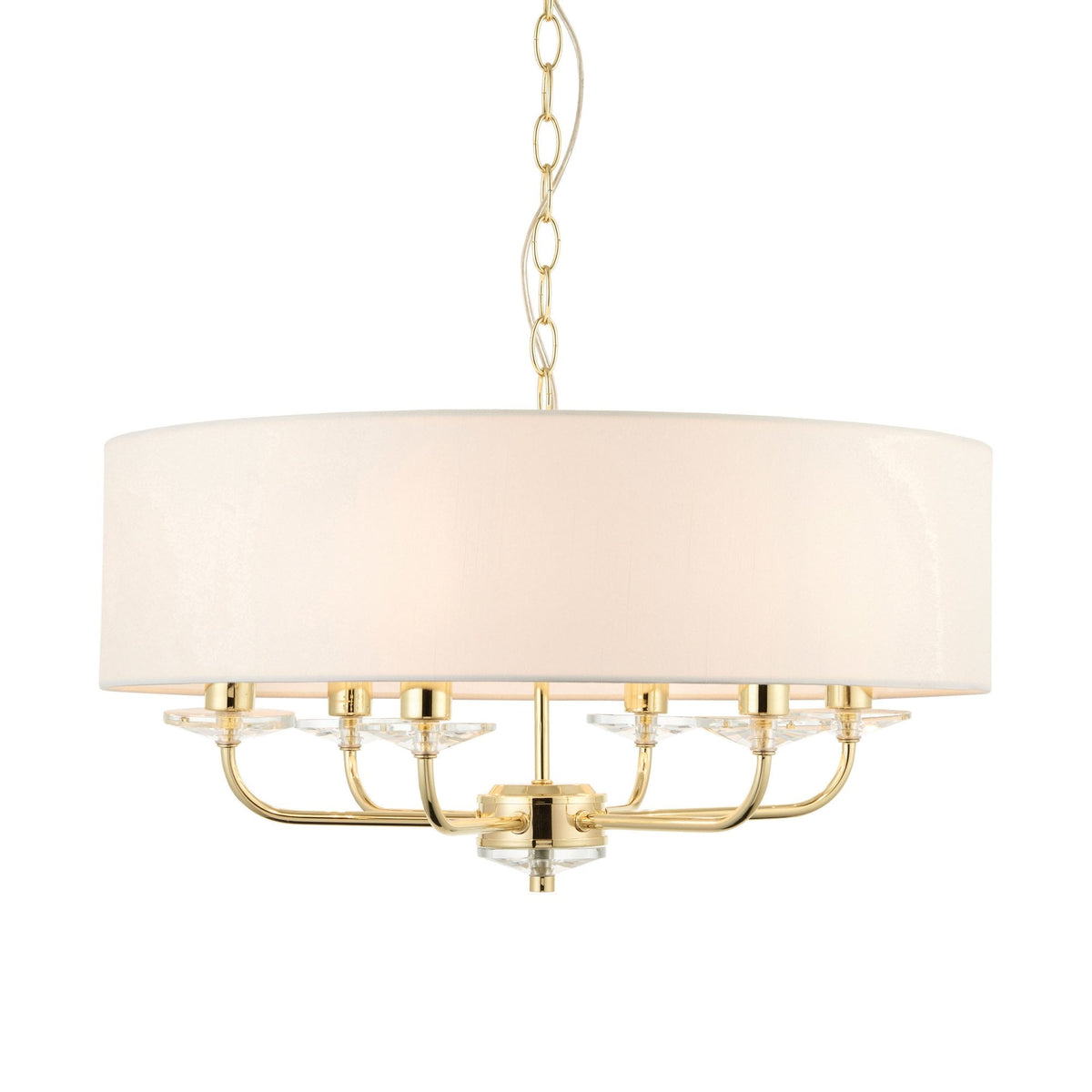Drum shade chandelier with gold finish and crystal accents on a white background.