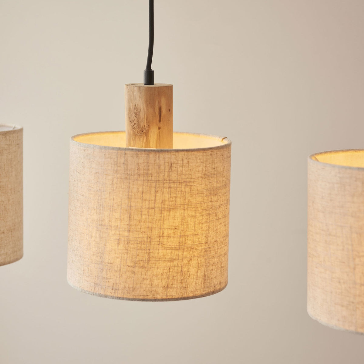 Durban Triple Drop Linear Pendant with Natural Linen Shades and Wooden Details