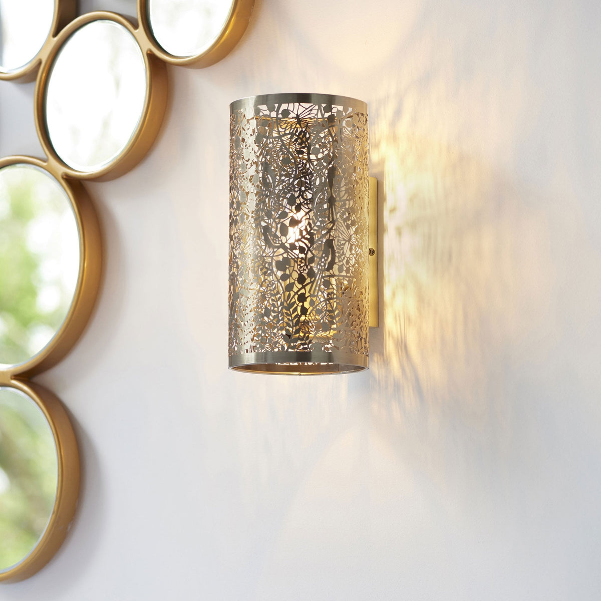 Secret Garden Cut Out Wall Light in Antique Brass