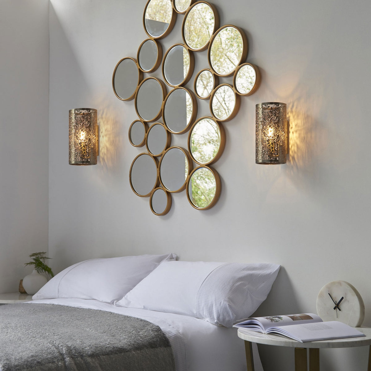 Secret Garden Cut Out Wall Light in Antique Brass