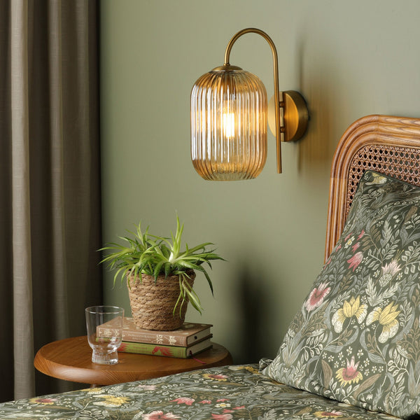 Idra Switched Wall Light In Aged Bronze With Champagne Ribbed Glass Shade