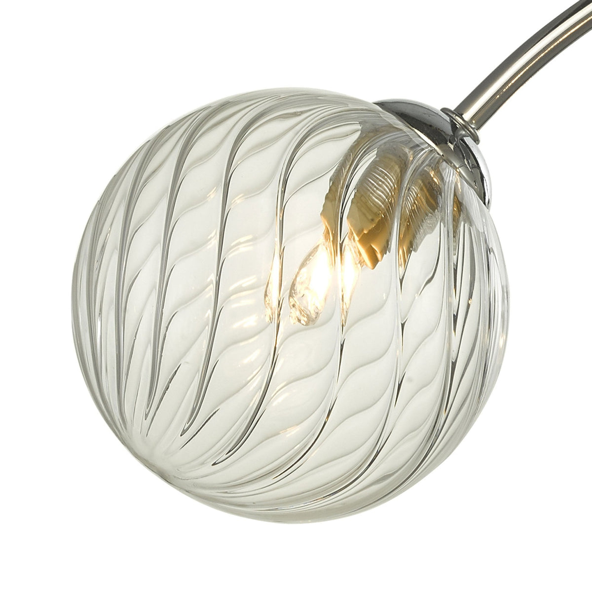 Close-up of a clear, textured glass light shade with a glowing bulb inside, attached to a chrome arm.