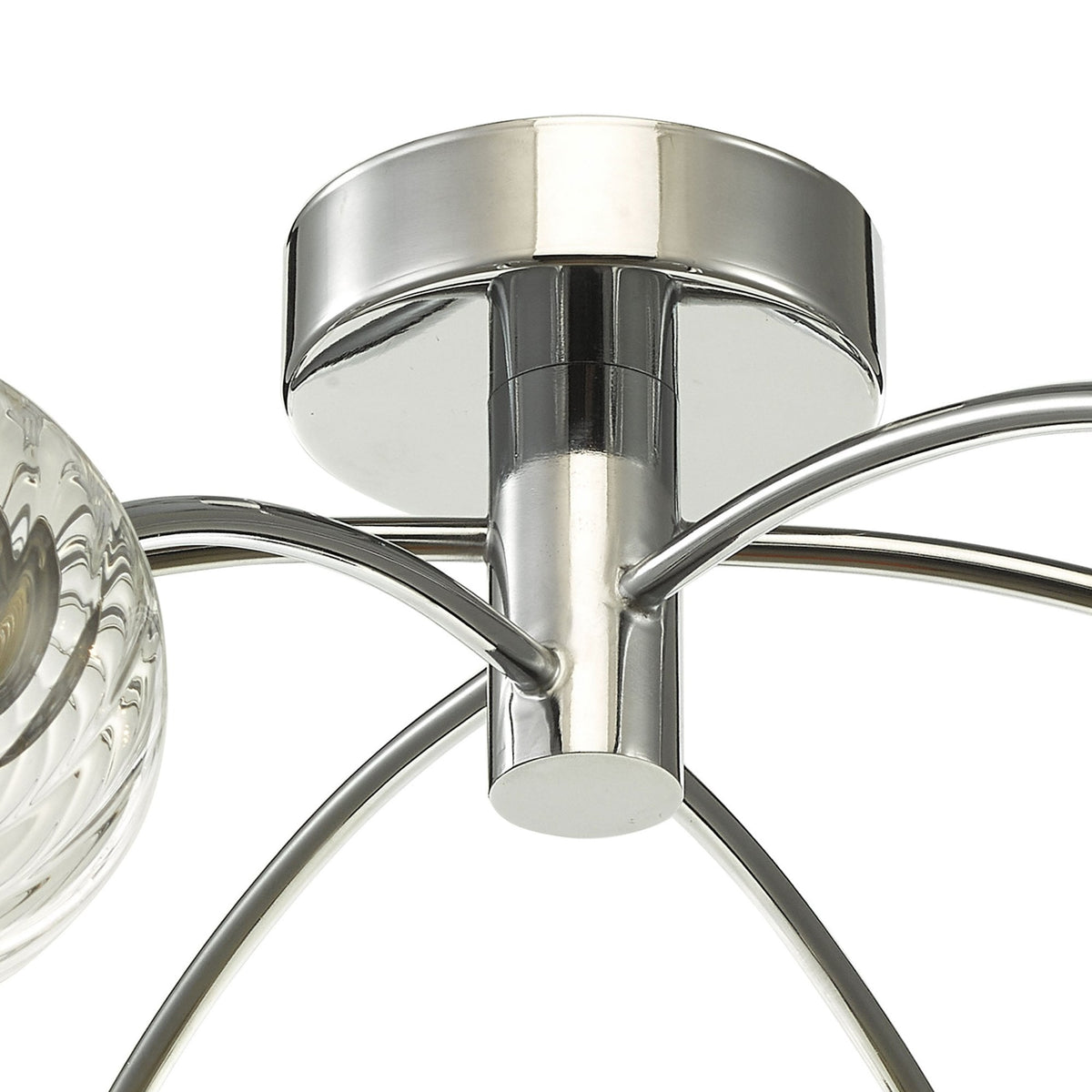 Close-up of a chrome ceiling light fixture with curved arms and a textured glass shade.
