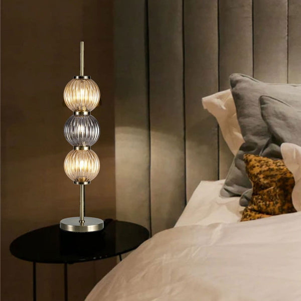Fiddleford Table Lamp in Antique Brass with Smoked & Amber Glass