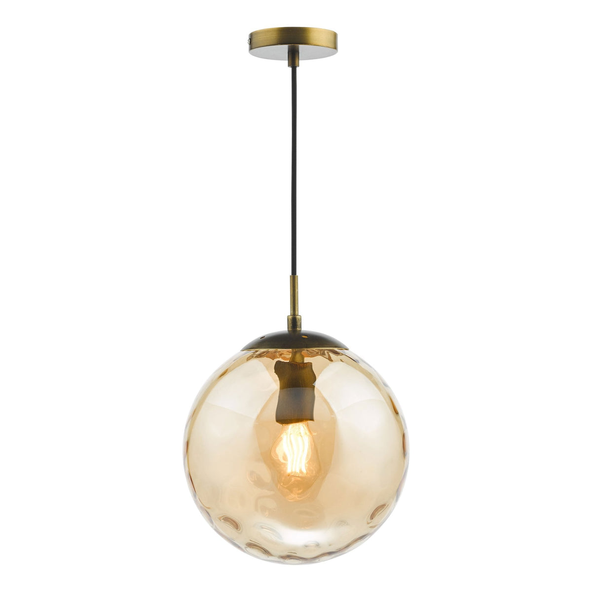 Amber glass globe pendant light with a brass fixture and exposed filament bulb.