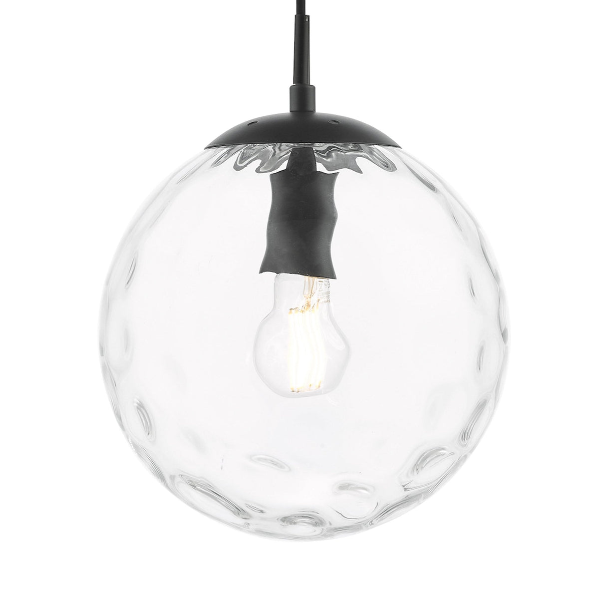 Clear glass globe pendant light with a textured surface and a visible filament bulb inside.