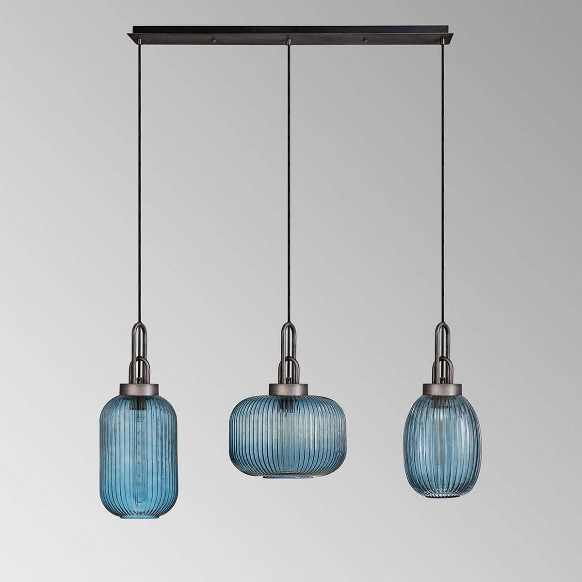 Atherington 3 Drop Linear Pendant in Aged Pewter with Ribbed Petrol Blue Shades