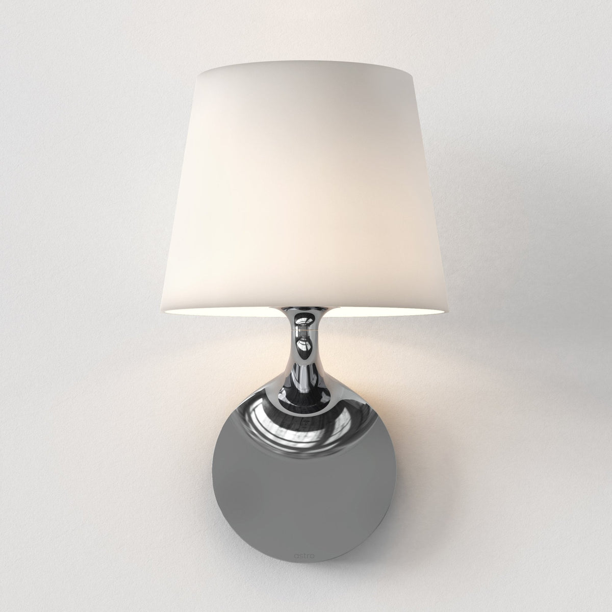 White fabric shade wall light with a polished chrome base