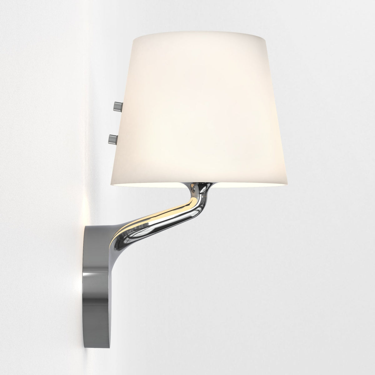 Wall-mounted lamp with a white conical shade and a curved chrome arm