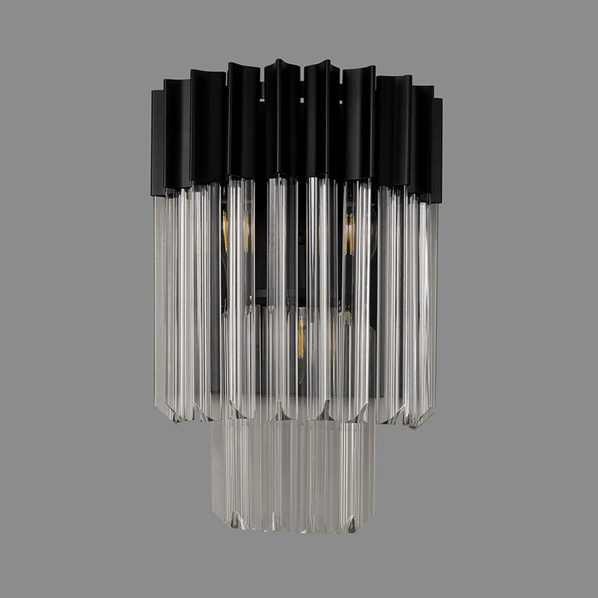 A modern black and clear glass wall light with the lights off, against a grey background.