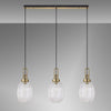 Atherington Almond 3 Drop Linear Pendant in Brass Gold & Clear Ribbed Shade