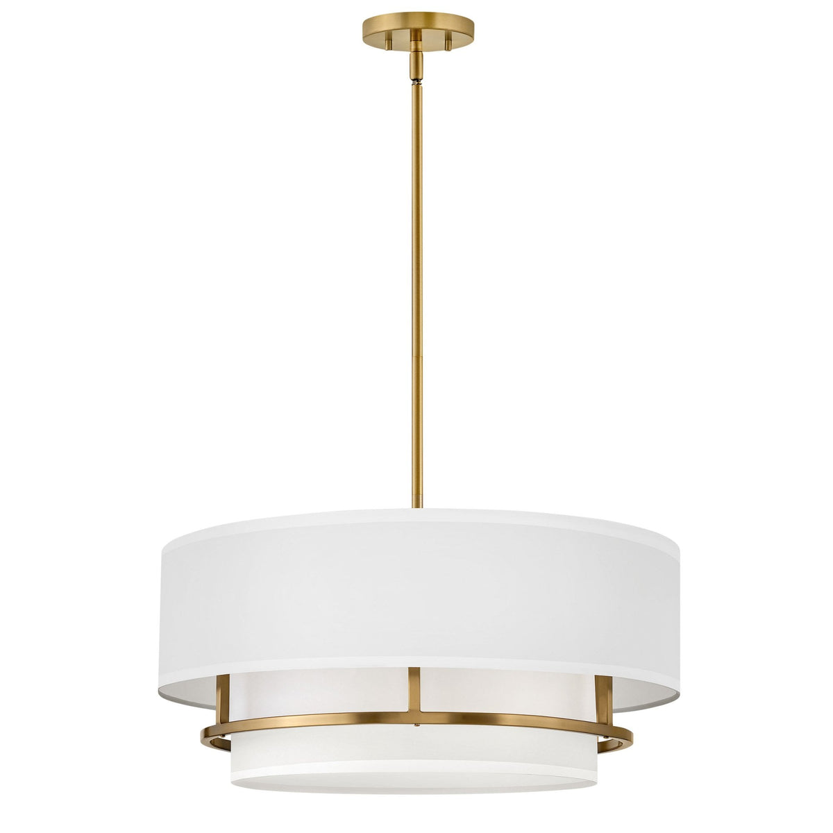 A large pendant light with a white fabric shade and brass accents on a white background.