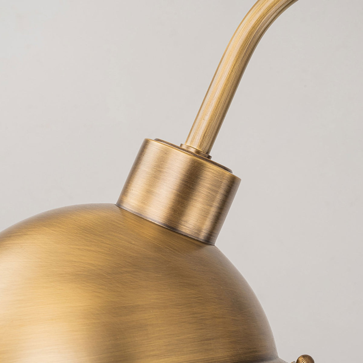 Chiswick IP44 Wall Sign Light in Antique Brass with Clear Prismatic Glass
