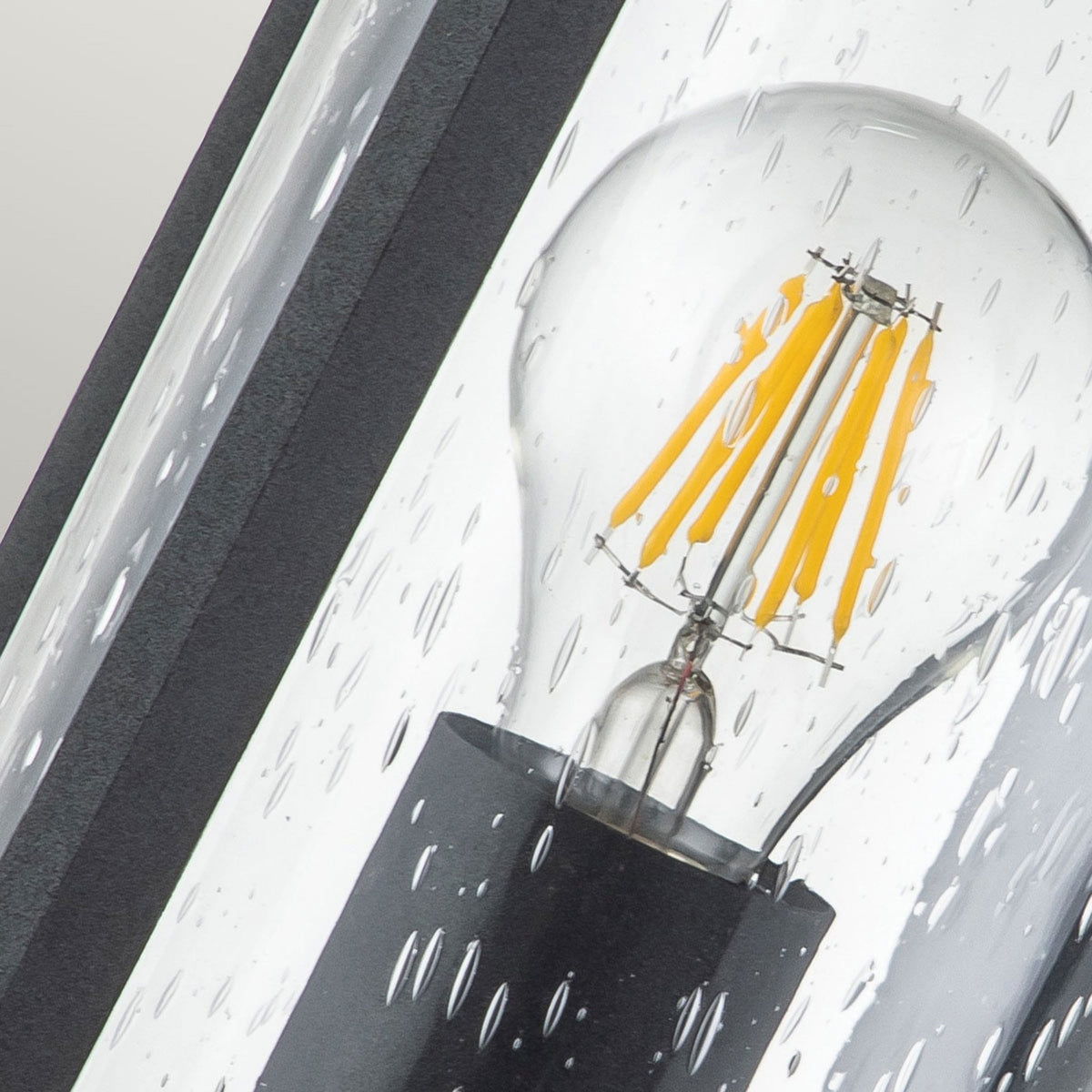 Merrill Small Wall Lantern in Black with Clear Seeded Glass