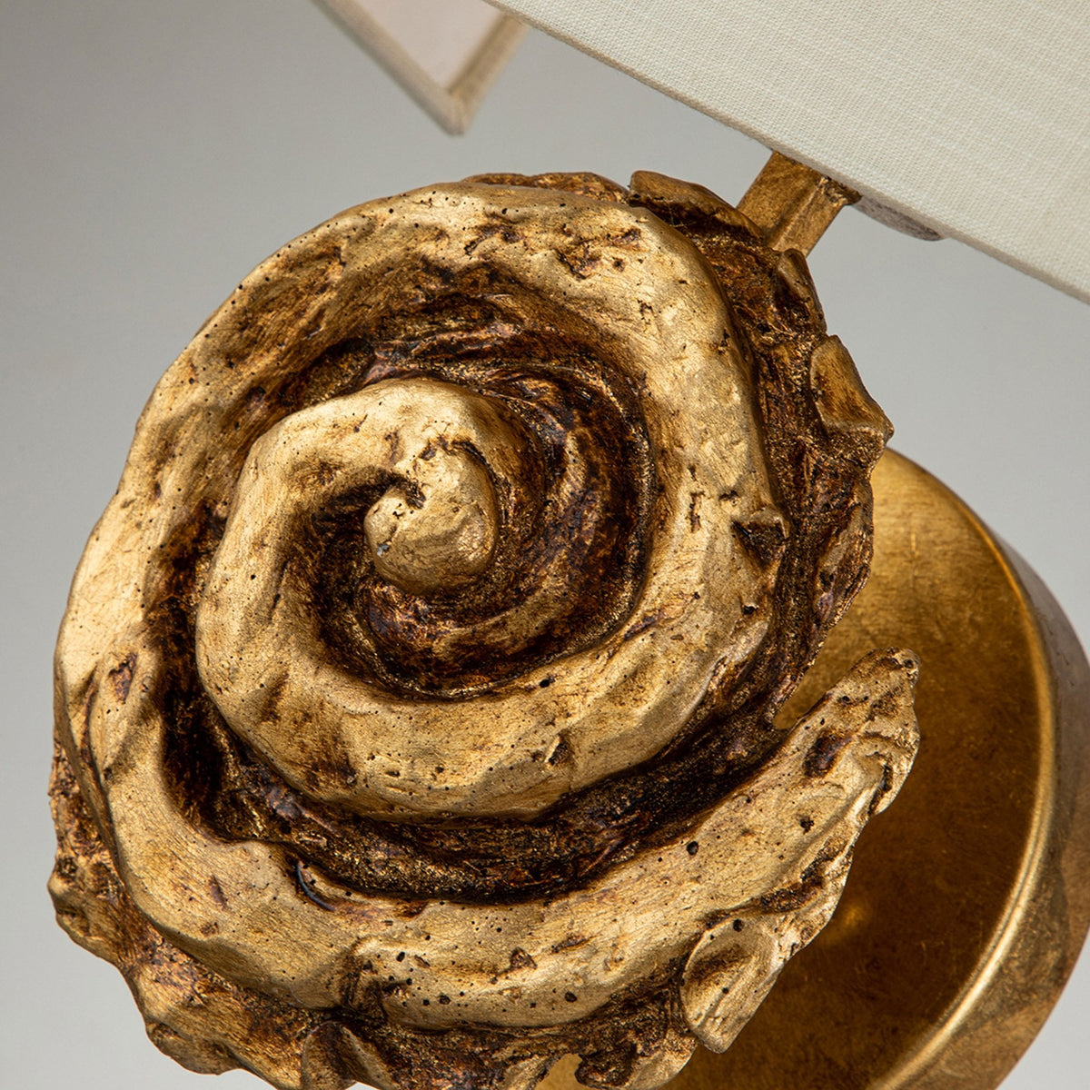 Swirl Large Wall Light in an Antiqued Gold Leaf Finish with Linen Shade