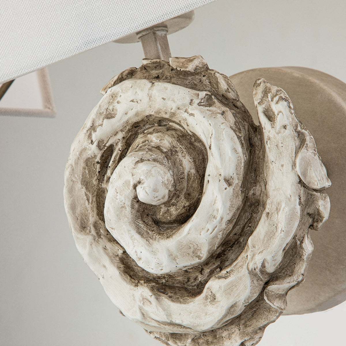 Swirl Large Wall Light in an Antiqued Bone White Finish with Linen Shade