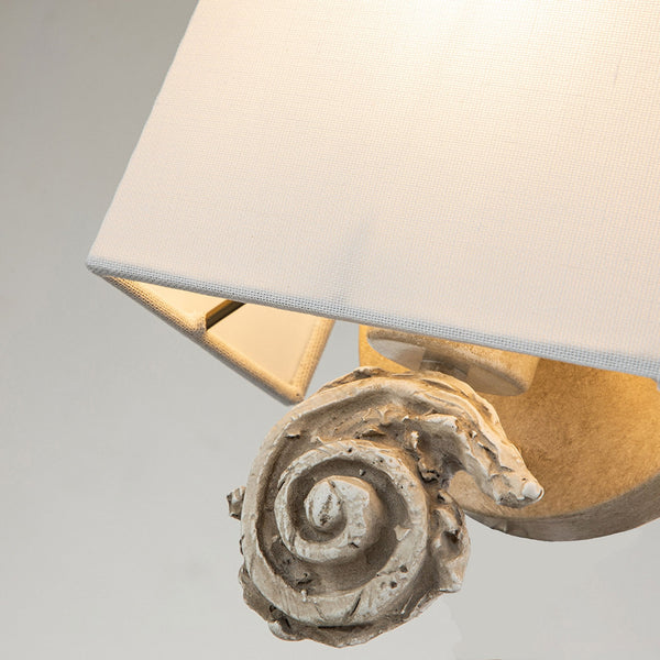 Swirl Small Wall Light in an Antiqued Bone White Finish with Linen Shade