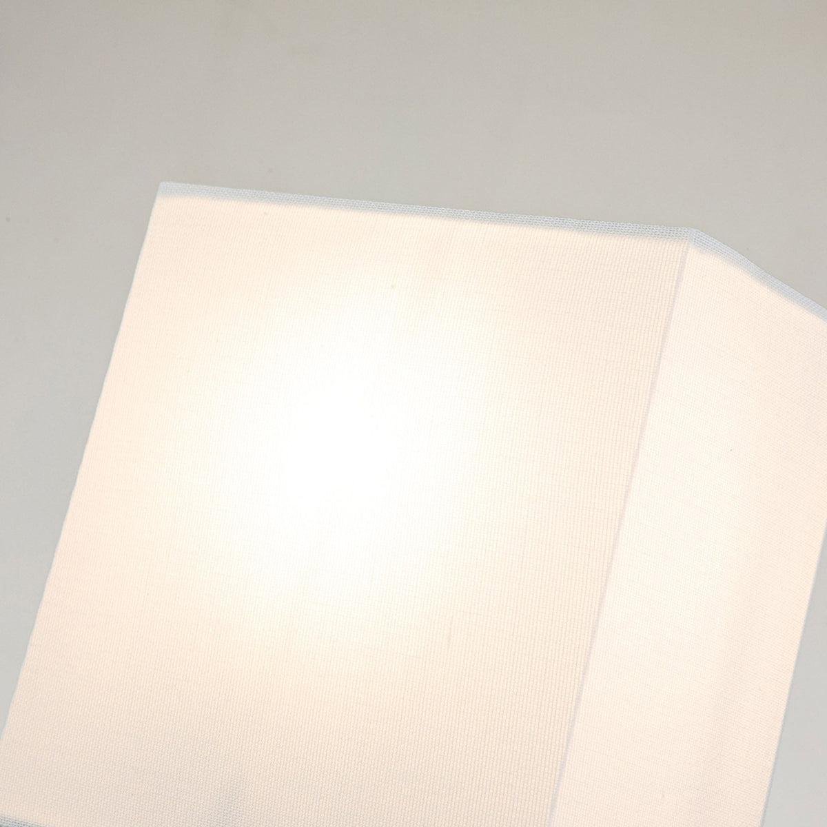 Swirl Small Wall Light in an Antiqued Bone White Finish with Linen Shade