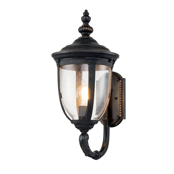 Cleveland Medium Up Arm Wall Lantern in Weathered Bronze with Clear Seeded Glass