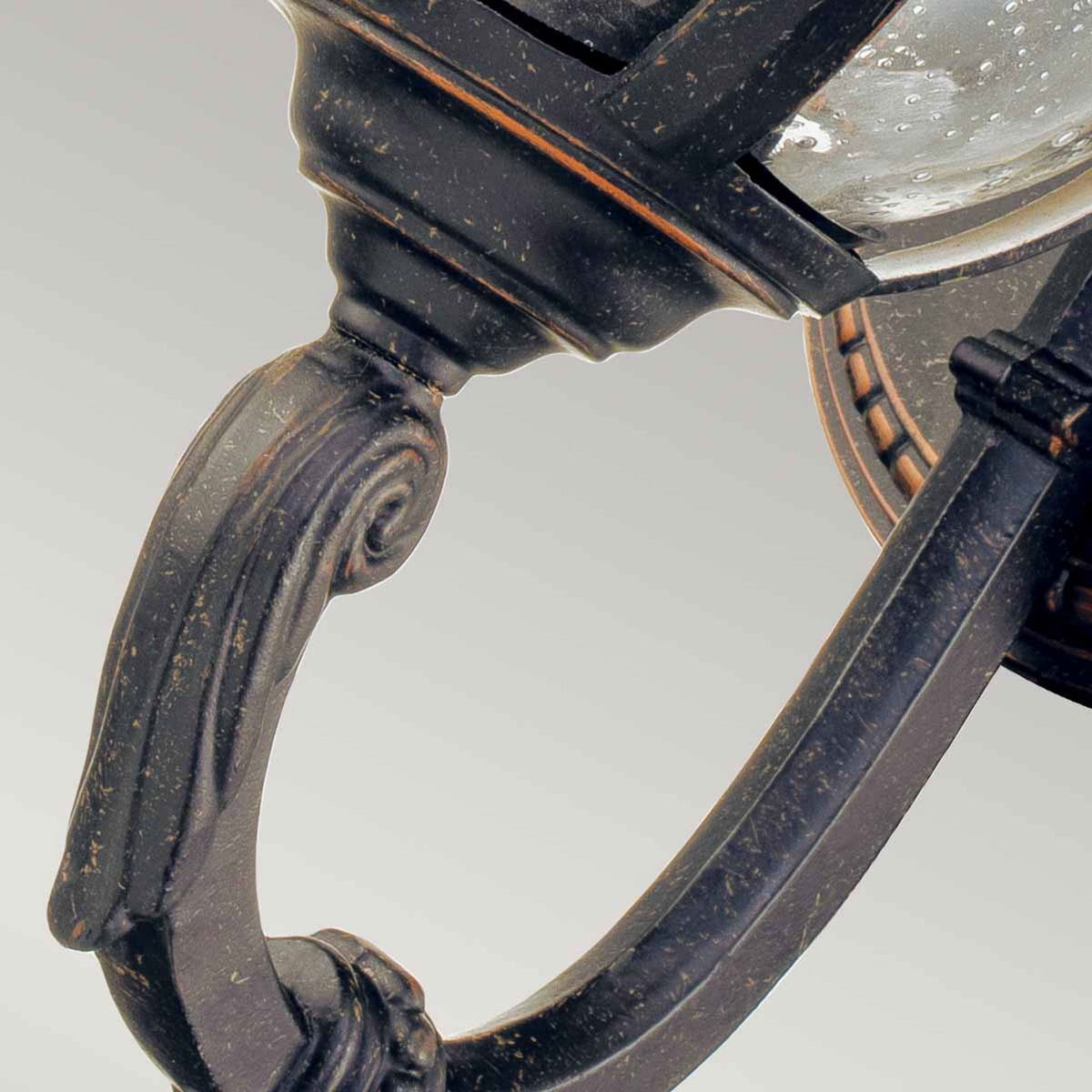 Cleveland Small Up Arm Wall Lantern in Weathered Bronze with Clear Seeded Glass