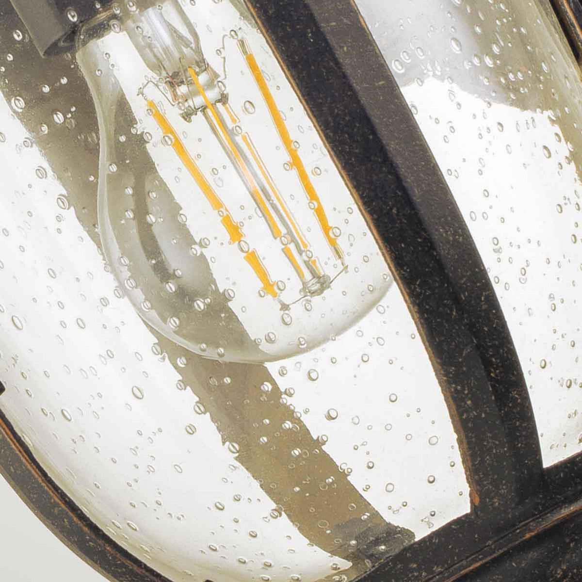 Cleveland Small Down Arm Wall Lantern in Weathered Bronze with Clear Seeded Glass