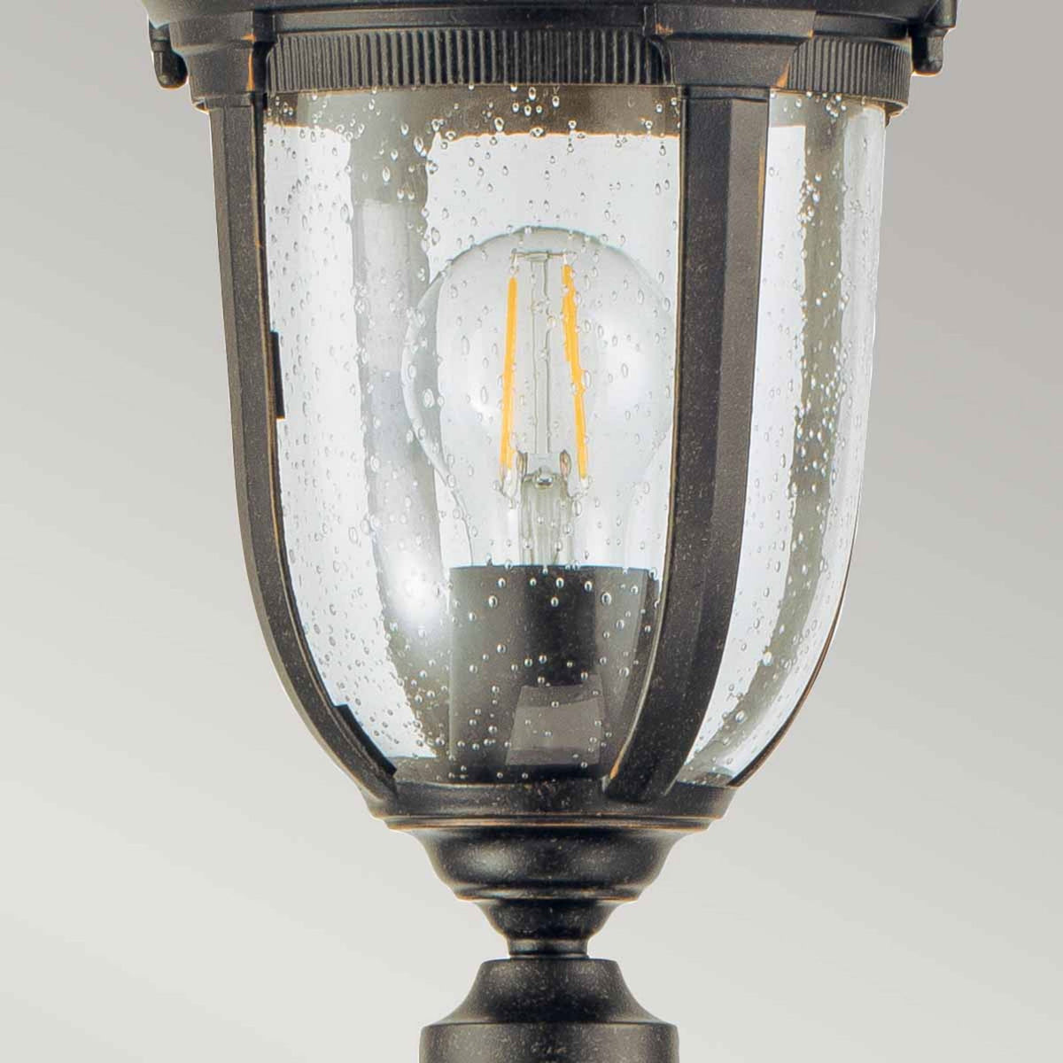 Cleveland Small Pillar Lantern in Weathered Bronze with Clear Seeded Glass