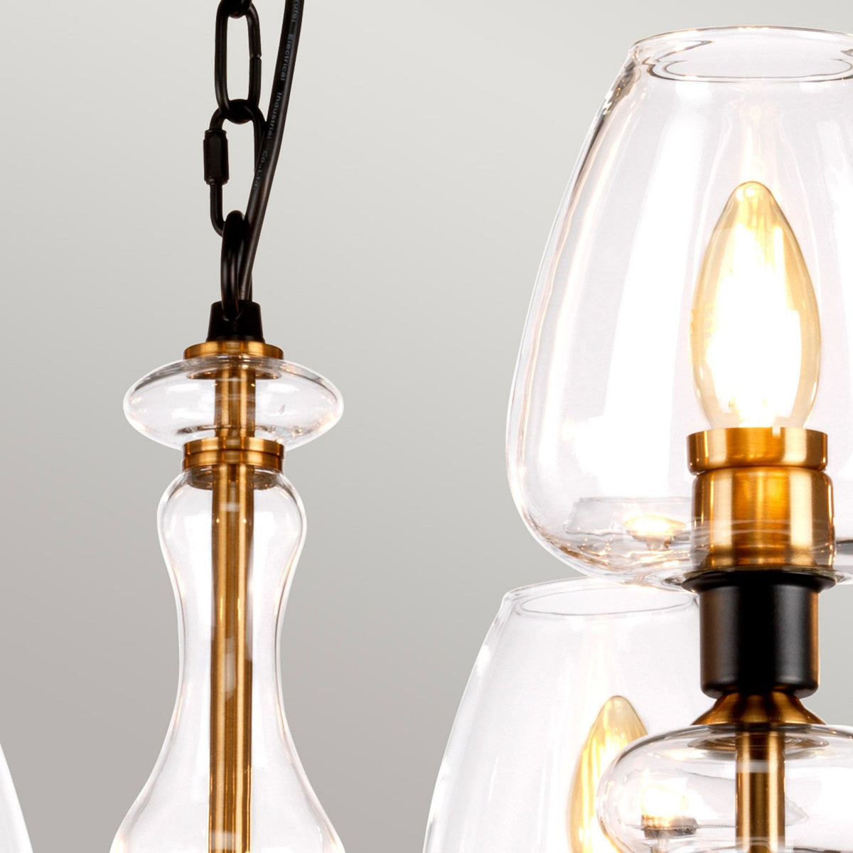 Armand Eight Arm Pendant in Aged Brass & Charcoal Black with Clear Shades