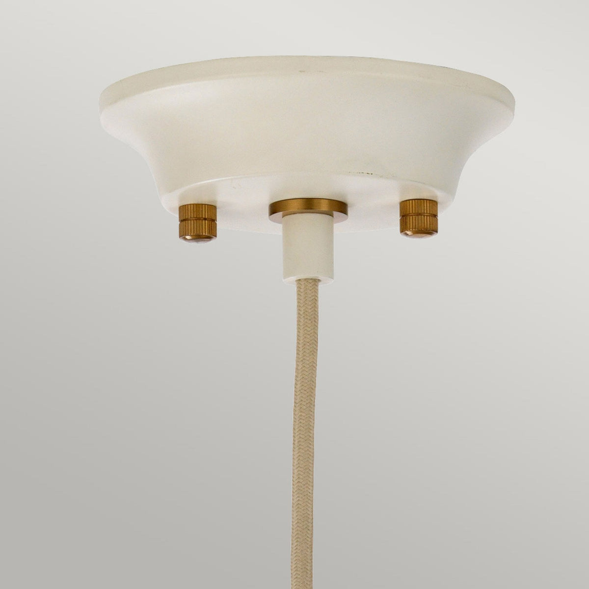 Cosmos Single Pendant in a Cream Finish with Aged Brass Detailing and Clear Ribbed Glass