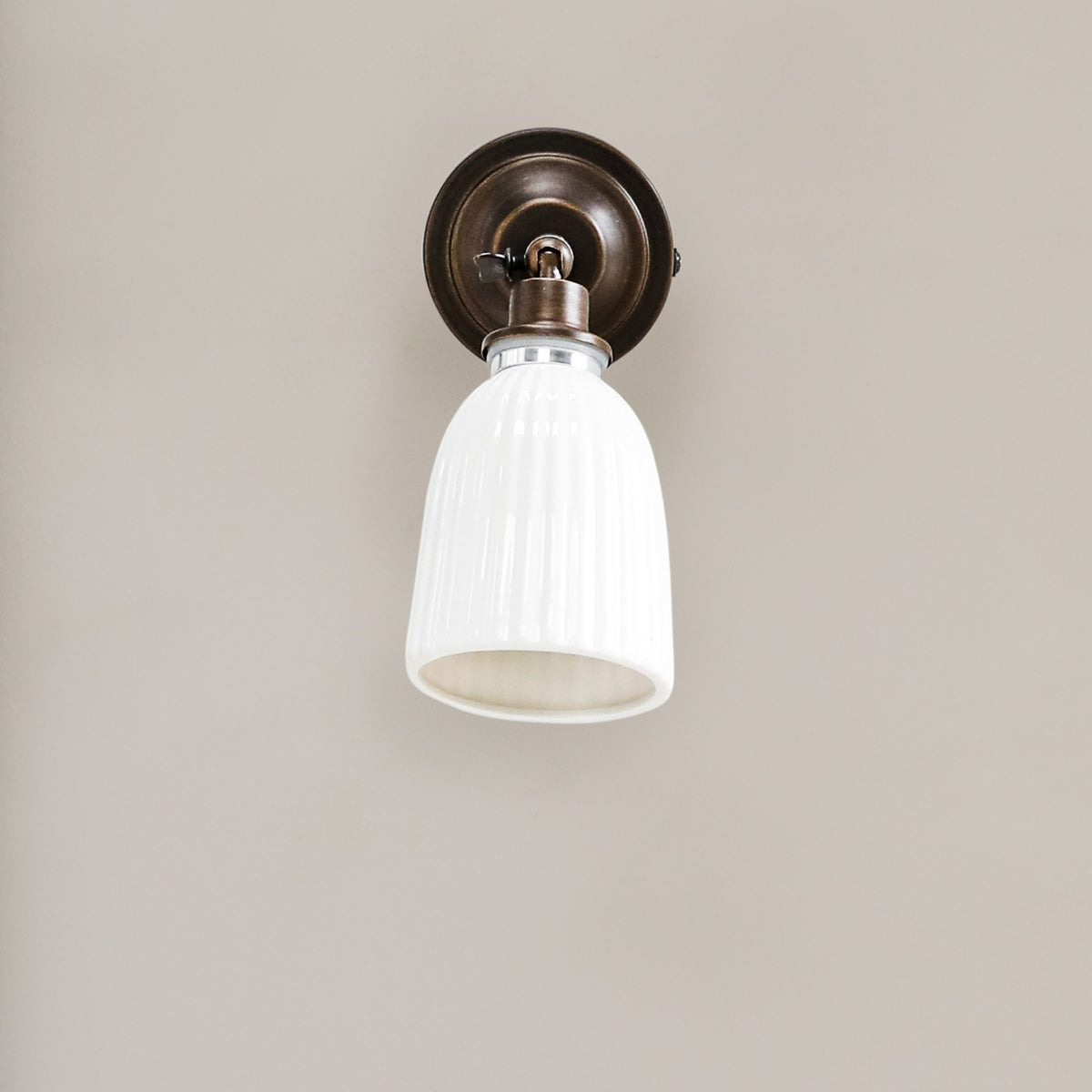 Alma Ceramic Bathroom Spot Light in Antique Bronze
