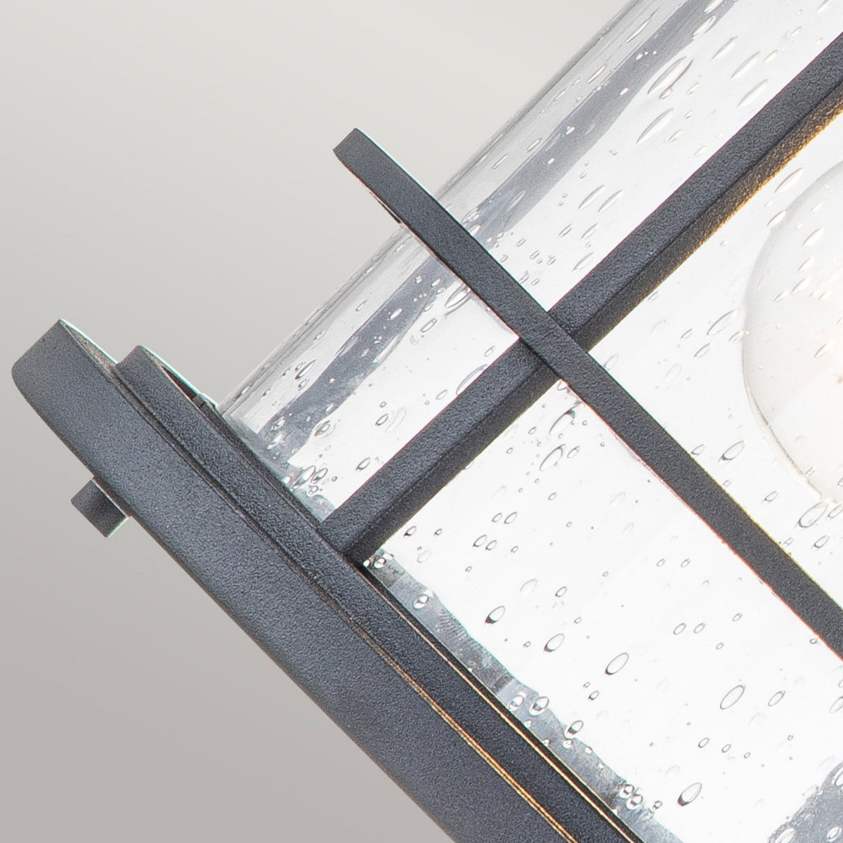 Lighthouse IP44 Medium Wall Lantern in Textured Black with Clear Seeded Glass