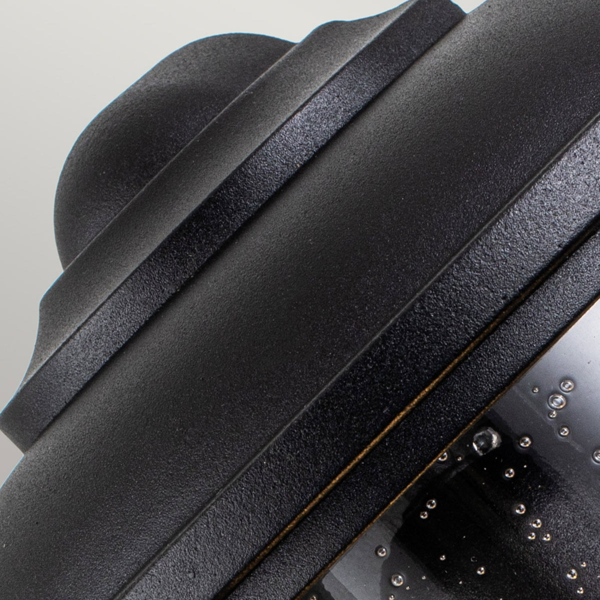 Lighthouse IP44 Half Wall Lantern in Textured Black with Clear Seeded Glass