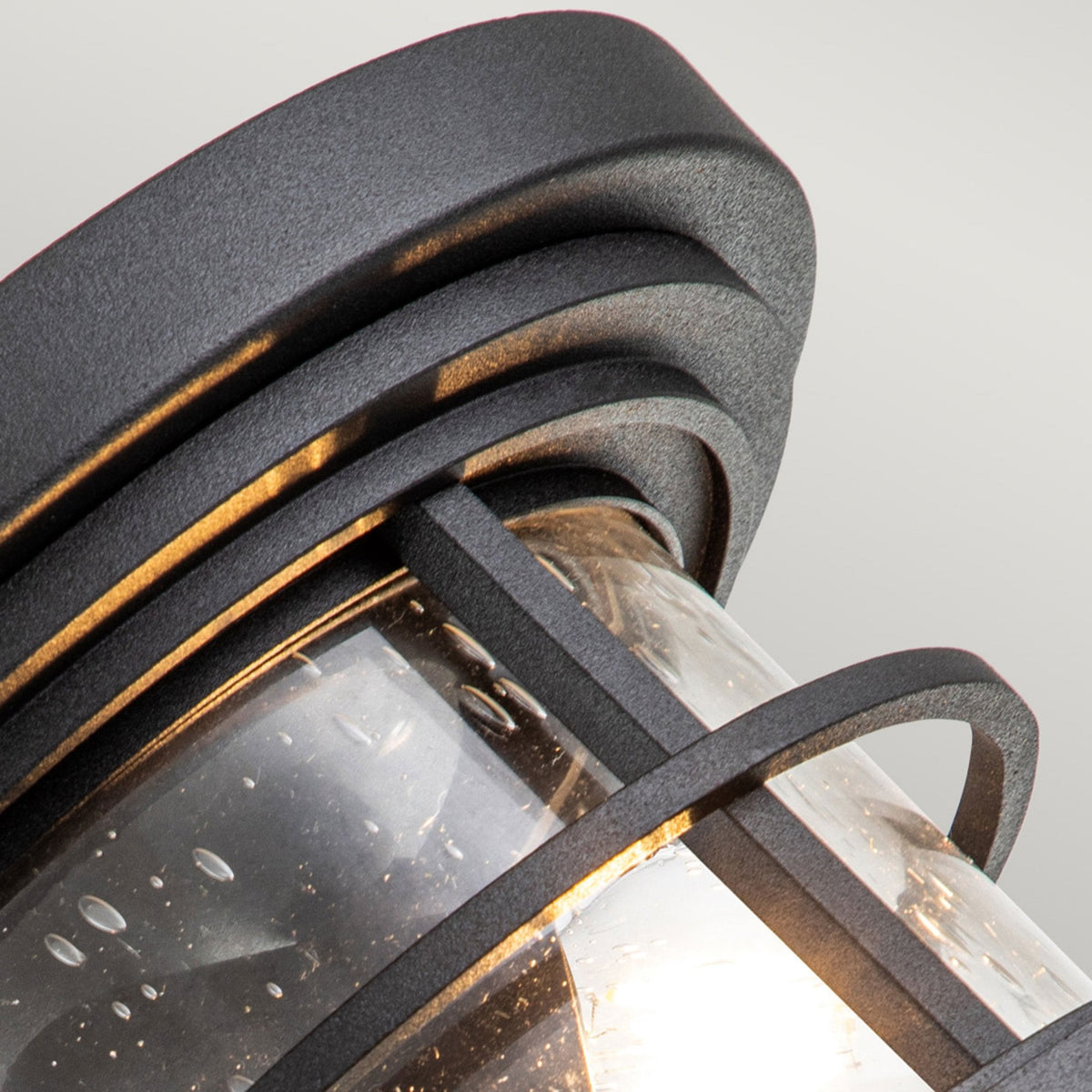 Lighthouse IP44 Flush Ceiling Light in Textured Black with Clear Seeded Glass