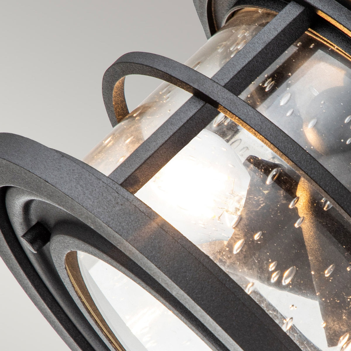 Lighthouse IP44 Flush Ceiling Light in Textured Black with Clear Seeded Glass
