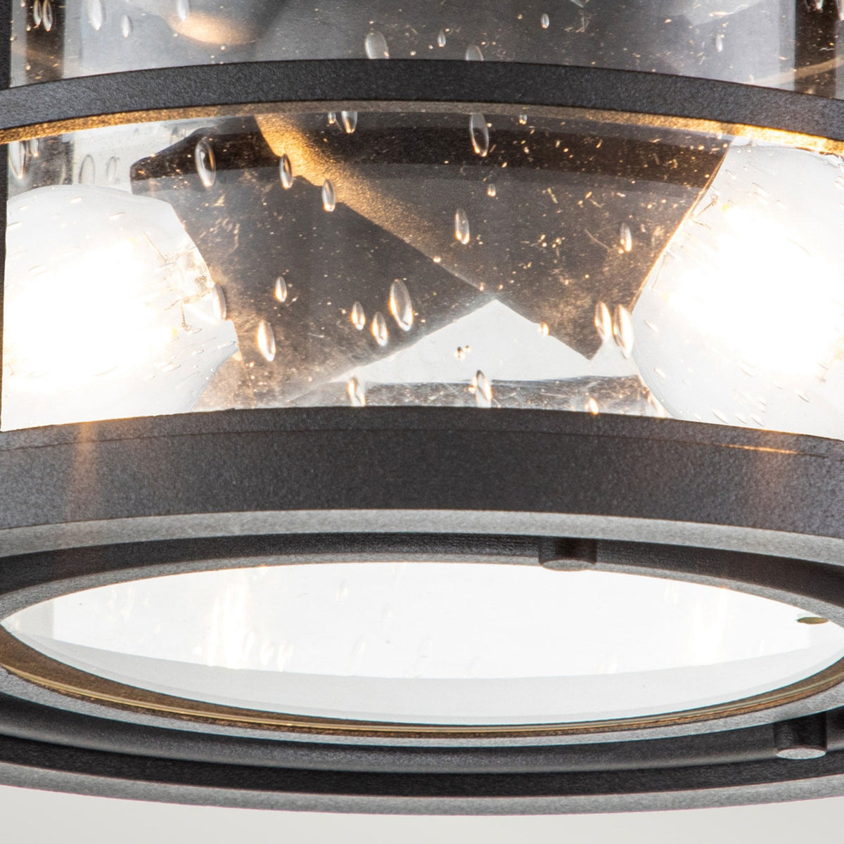 Lighthouse IP44 Flush Ceiling Light in Textured Black with Clear Seeded Glass